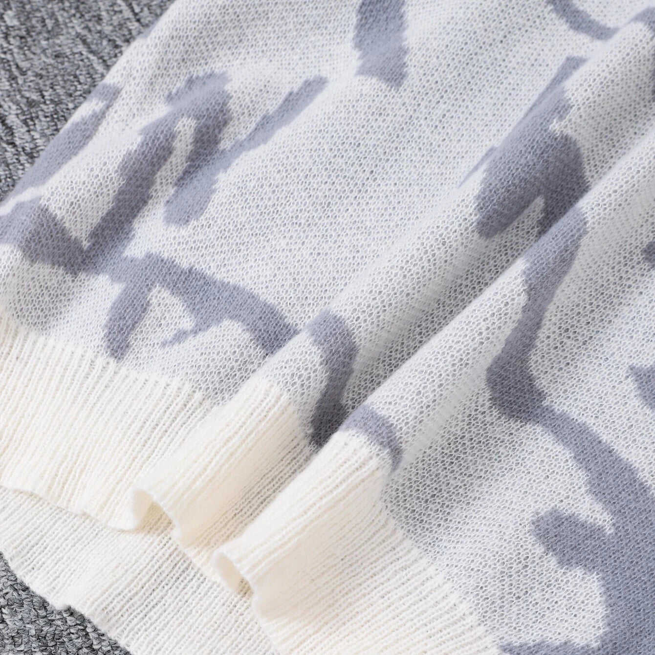 GRAFFITI PATTERN KNITTED SWEATER