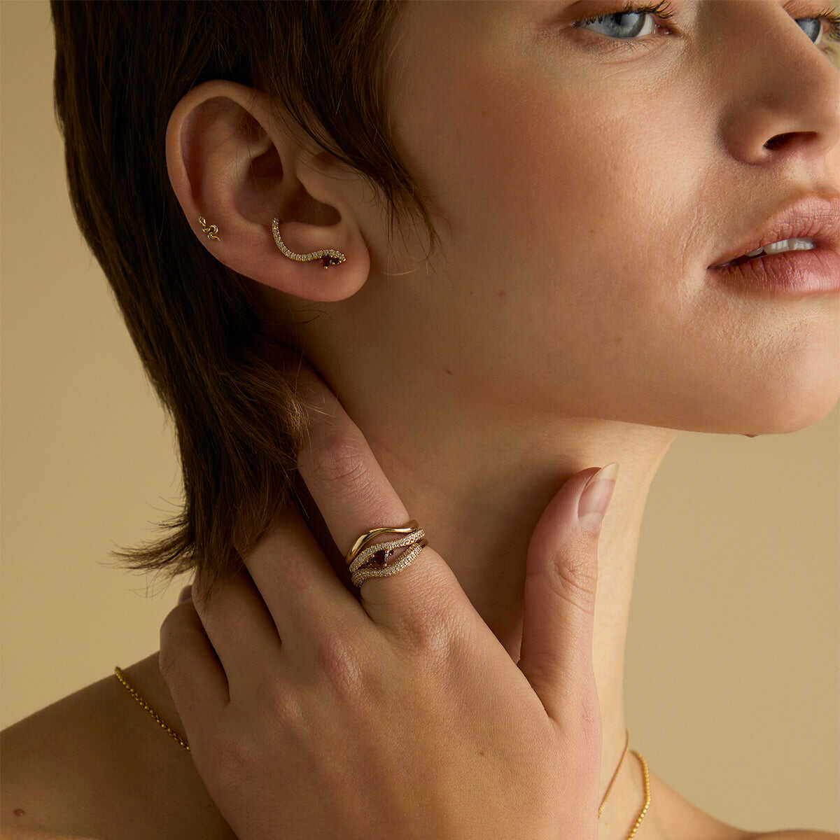 Garnet Serpent Wave Ring in Gold